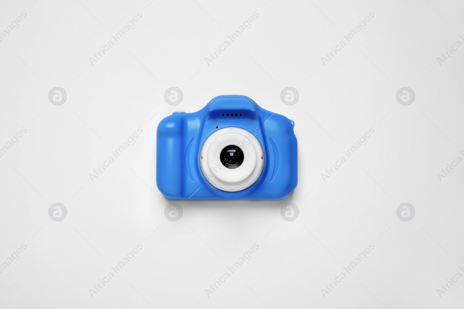 Photo of Toy camera isolated on white, top view. Classic blue - color of the Year 2020