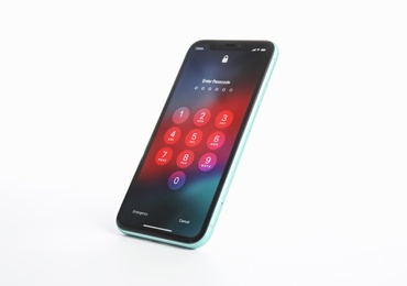 Photo of MYKOLAIV, UKRAINE - JULY 9, 2020: iPhone 11 with lock screen isolated on white