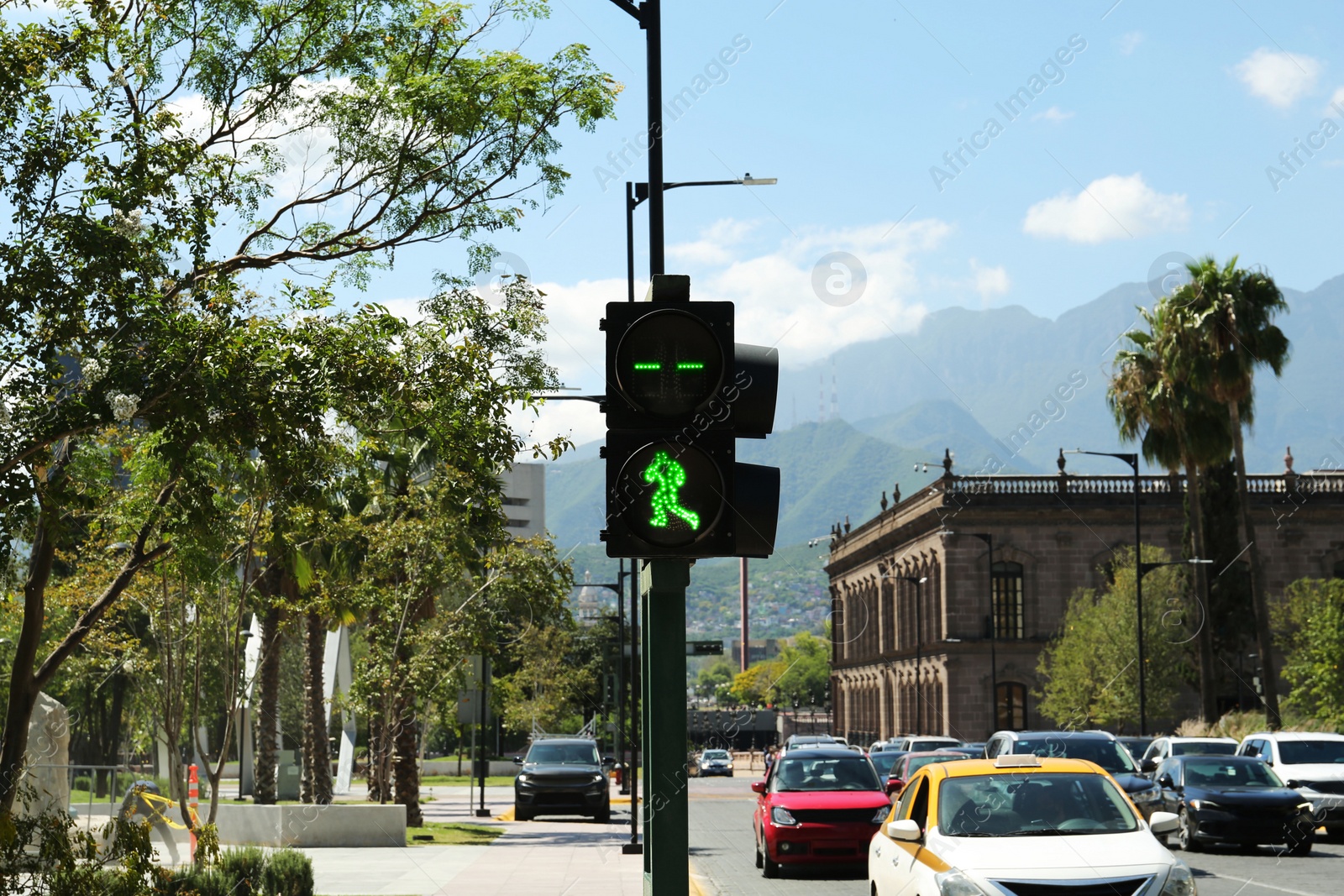 Photo of Traffic light on city street. Road rules