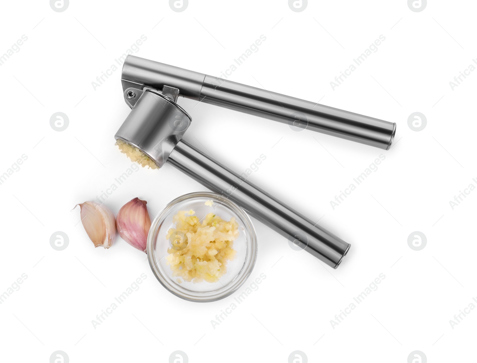 Photo of One metal press and garlic isolated on white