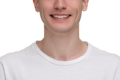 Photo of Man with clean teeth smiling on white background, closeup