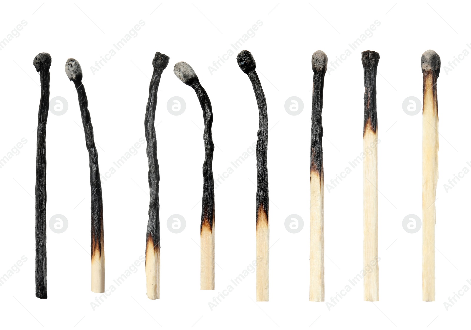 Image of Set with burnt matches on white background