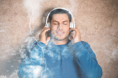 Image of Double exposure of beautiful rainy sky and man in headphones listening to music