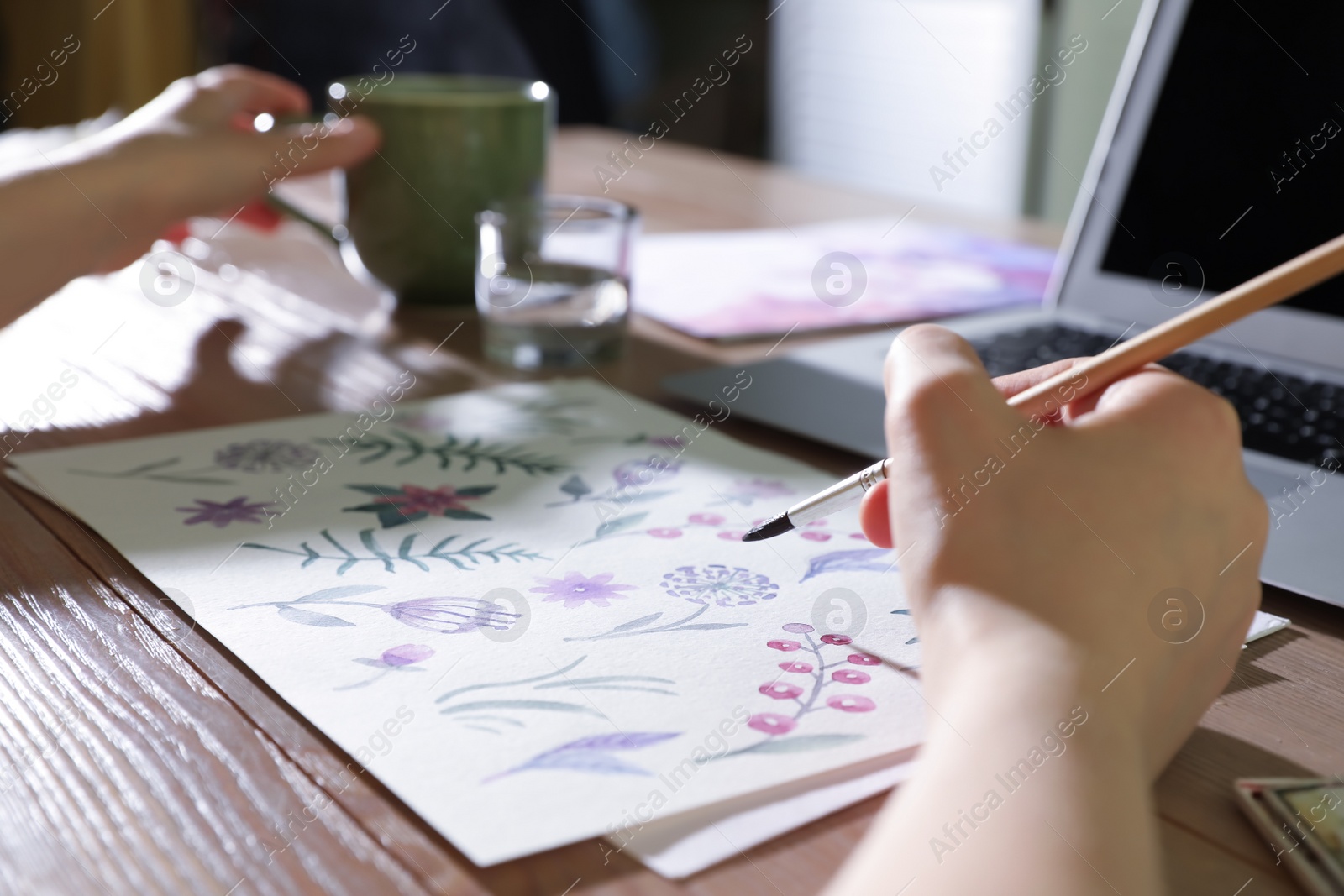 Photo of Woman drawing picture at online art lesson indoors, closeup. Distant learning