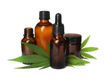 Photo of CBD oil, THC tincture and hemp leaves on white background