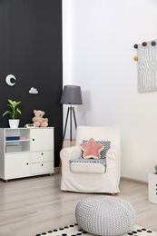 Photo of Modern child room interior with stylish furniture