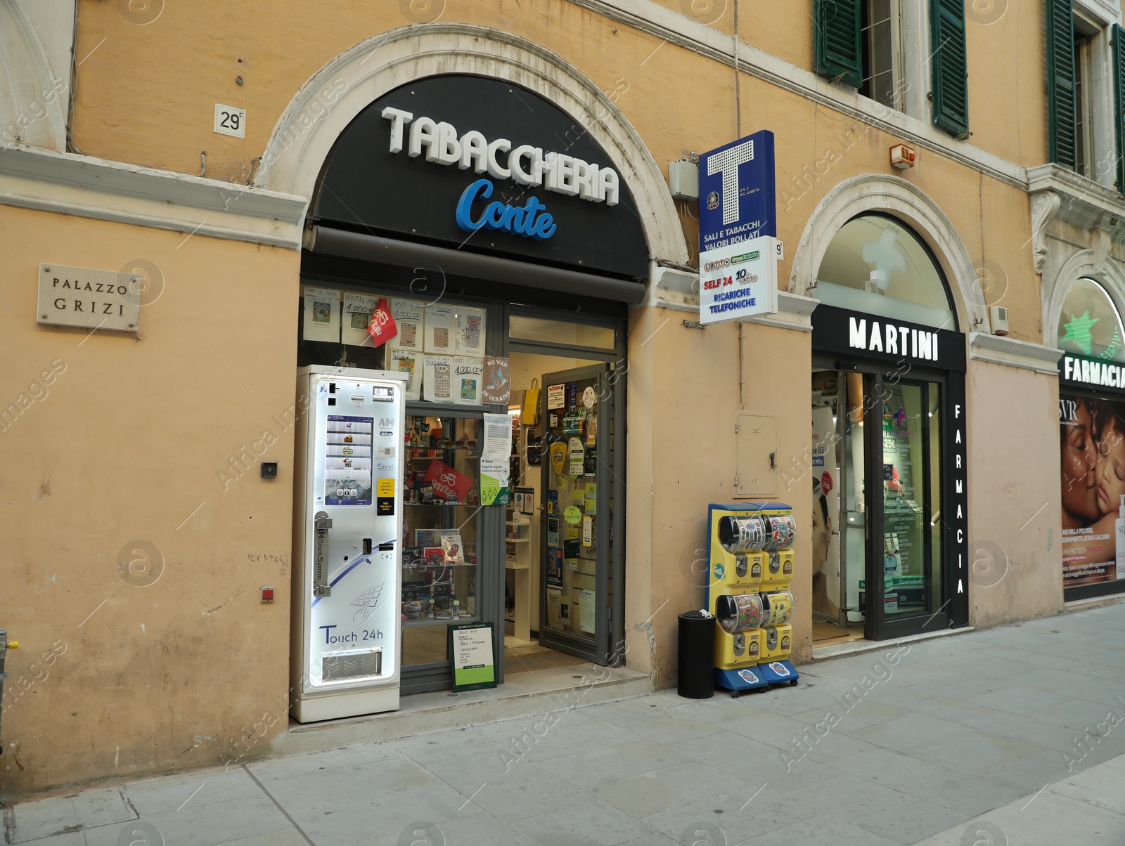 Photo of JESI, ITALY - MAY 17, 2022: Modern tobacco shop on city street
