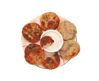 Photo of Plate of delicious vegan cutlets and sauce isolated on white, top view