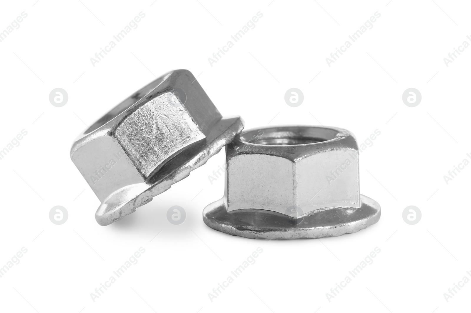 Photo of Two metal flange nuts on white background