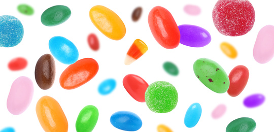 Set of different jelly candies falling on white background, banner design 