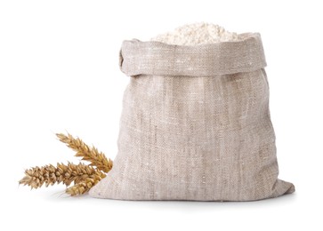 Photo of Bag with wheat flour and spikelets on white background