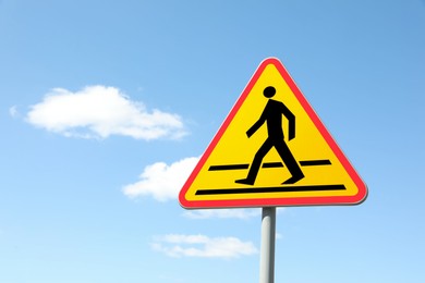 Photo of Traffic sign Pedestrian Crossing Ahead against blue sky, space for text
