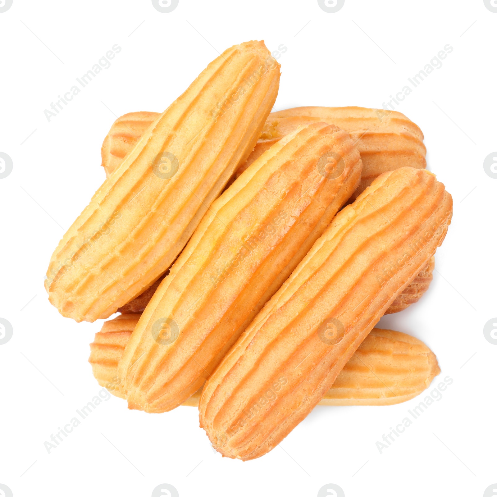 Photo of Many fresh delicious eclairs isolated on white, top view