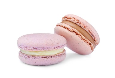 Photo of Pink macarons on white background. Delicious dessert