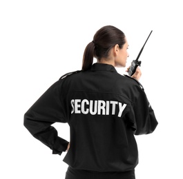 Female security guard using portable radio transmitter on white background