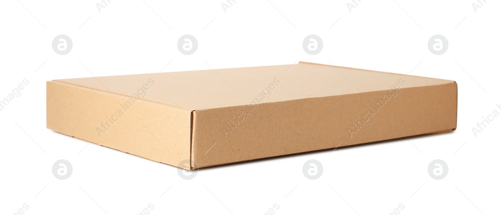 Photo of One closed cardboard box isolated on white