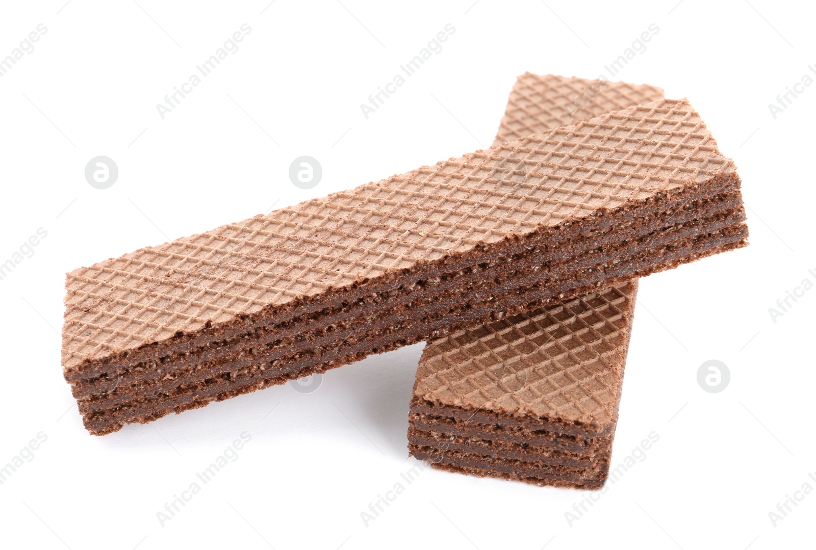 Photo of Delicious crispy wafers on white background. Sweet food