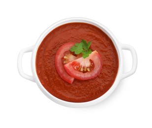 Photo of Delicious tomato cream soup in bowl isolated on white, top view