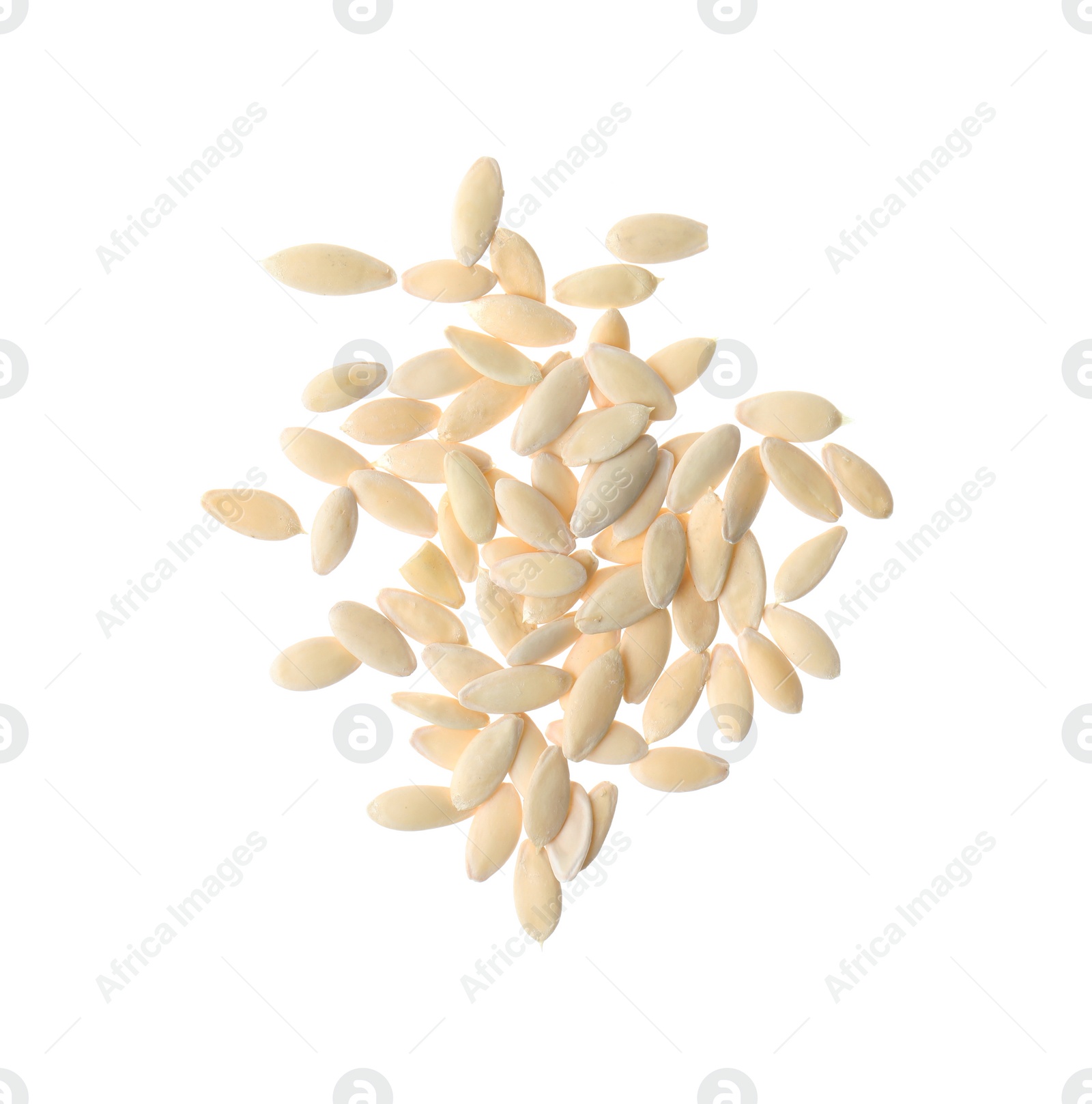 Photo of Pile of raw cucumber seeds on white background, top view. Vegetable planting