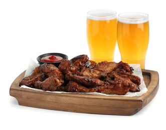 Photo of Tasty chicken wings, glasses of beer and ketchup isolated on white. Delicious snack