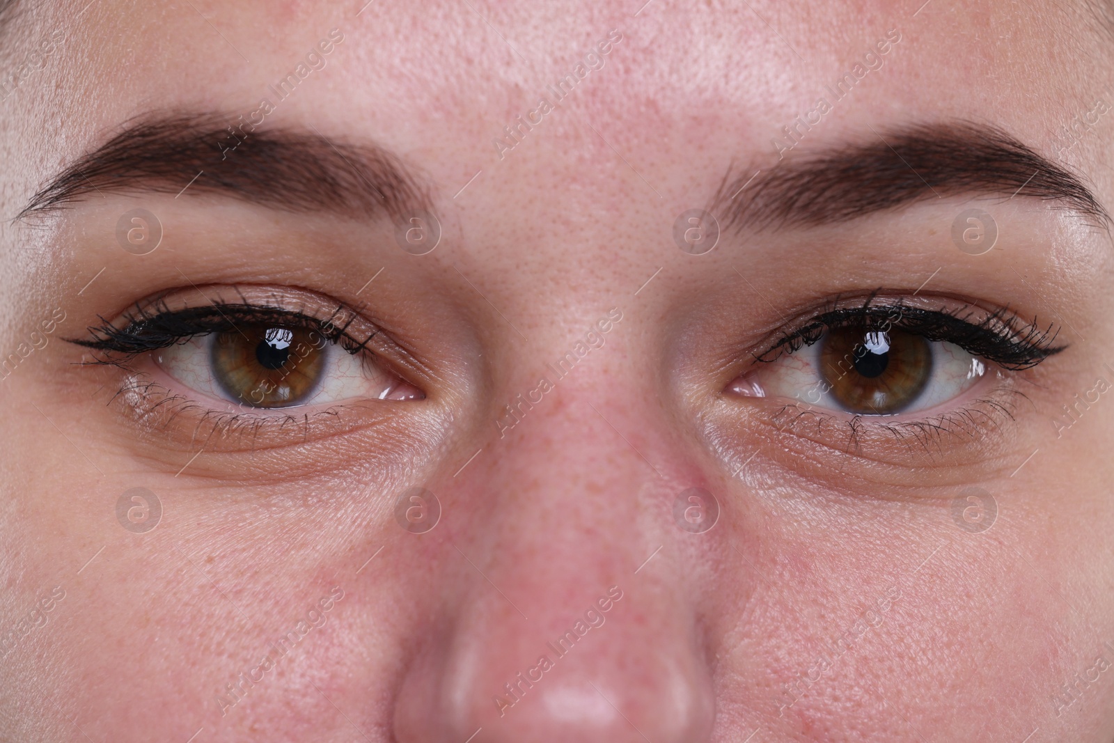 Photo of Closeup view of woman with beautiful hazel eyes