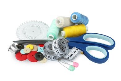 Set of different sewing accessories on white background