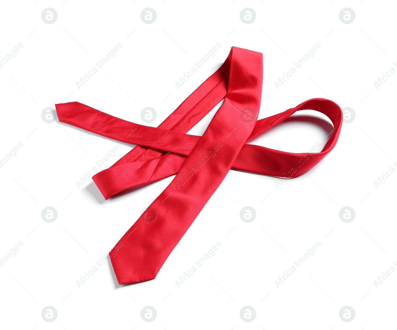 Photo of One red necktie isolated on white, above view