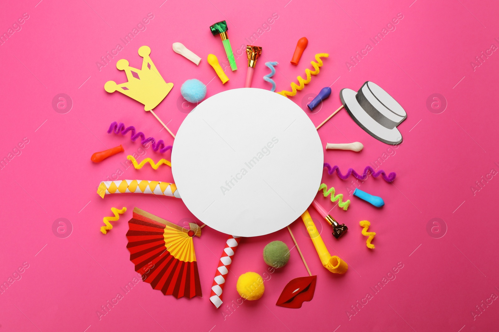 Photo of Flat lay composition with carnival items and blank card on pink background. Space for text