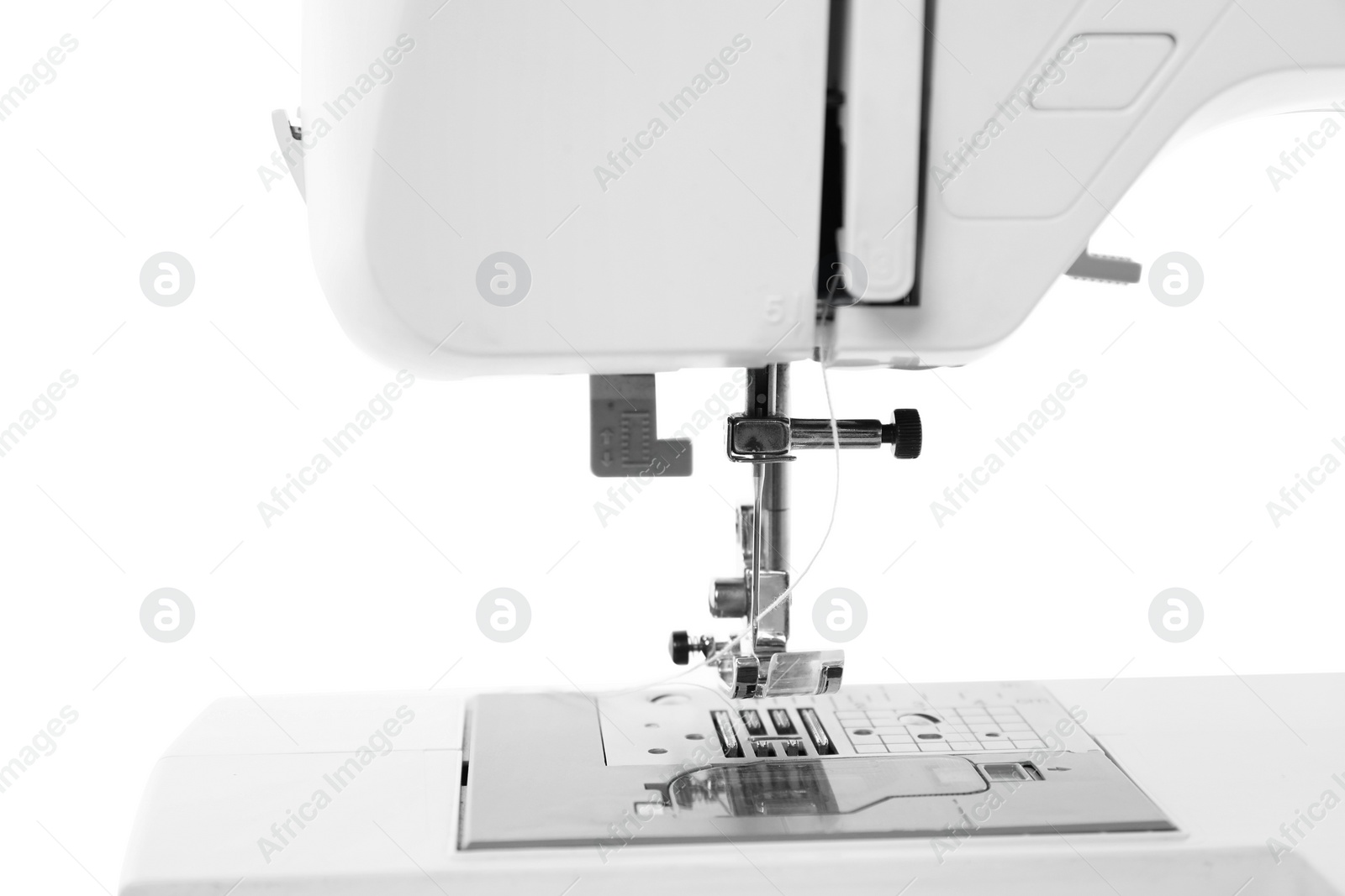 Photo of One modern sewing machine isolated on white