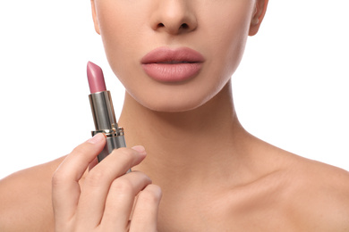 Woman with pink lipstick on white background, closeup