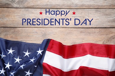 Image of Happy President's Day - federal holiday. American flag and text on wooden background, top view
