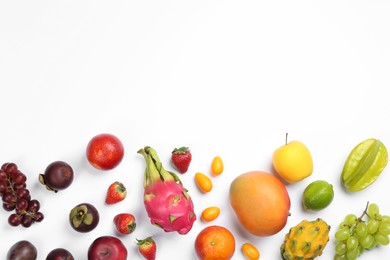 Many different delicious exotic fruits on white background, flat lay. Space for text