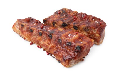 Photo of Tasty roasted pork ribs and peppercorns isolated on white