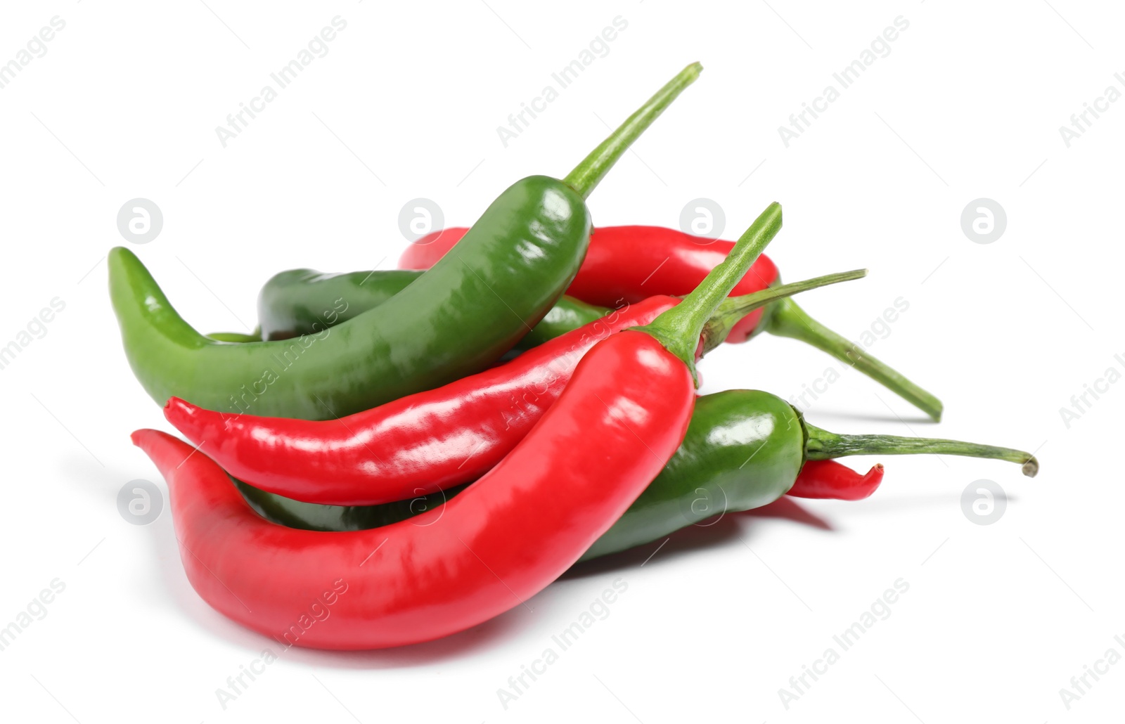 Photo of Ripe hot chili peppers on white background