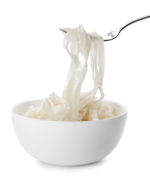 Photo of Taking rice noodles with fork from bowl on white background