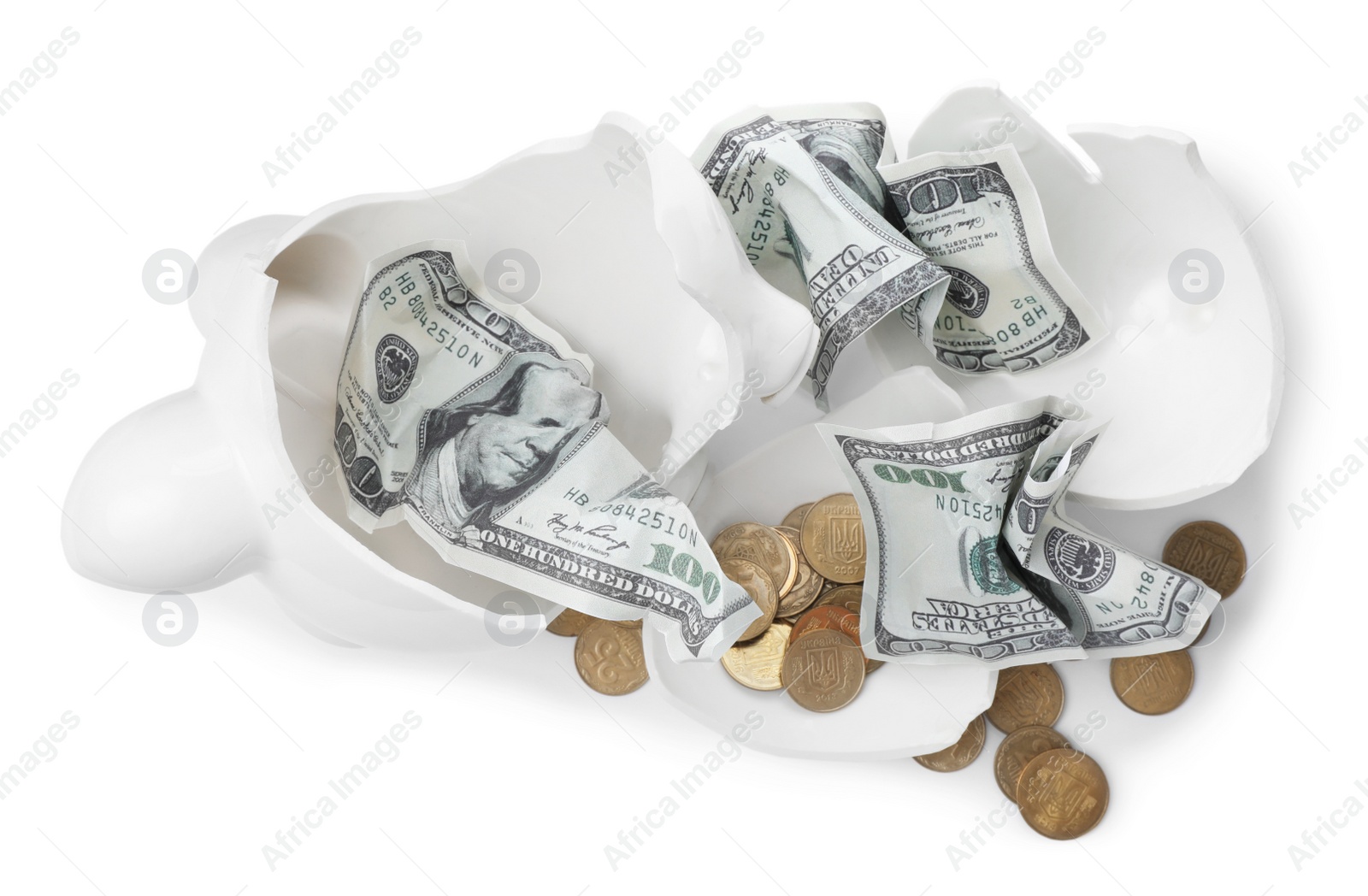 Photo of Broken piggy bank with coins and banknotes on white background. Money saving