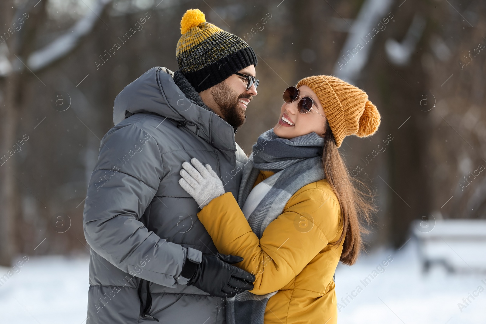 Photo of Beautiful happy couple outdoors on winter day