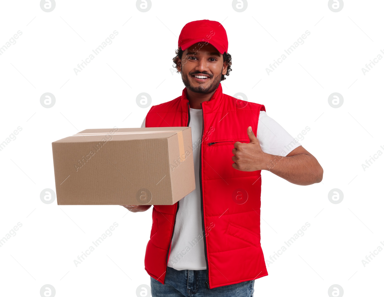 Photo of Happy courier with parcel showing thumb up on white background