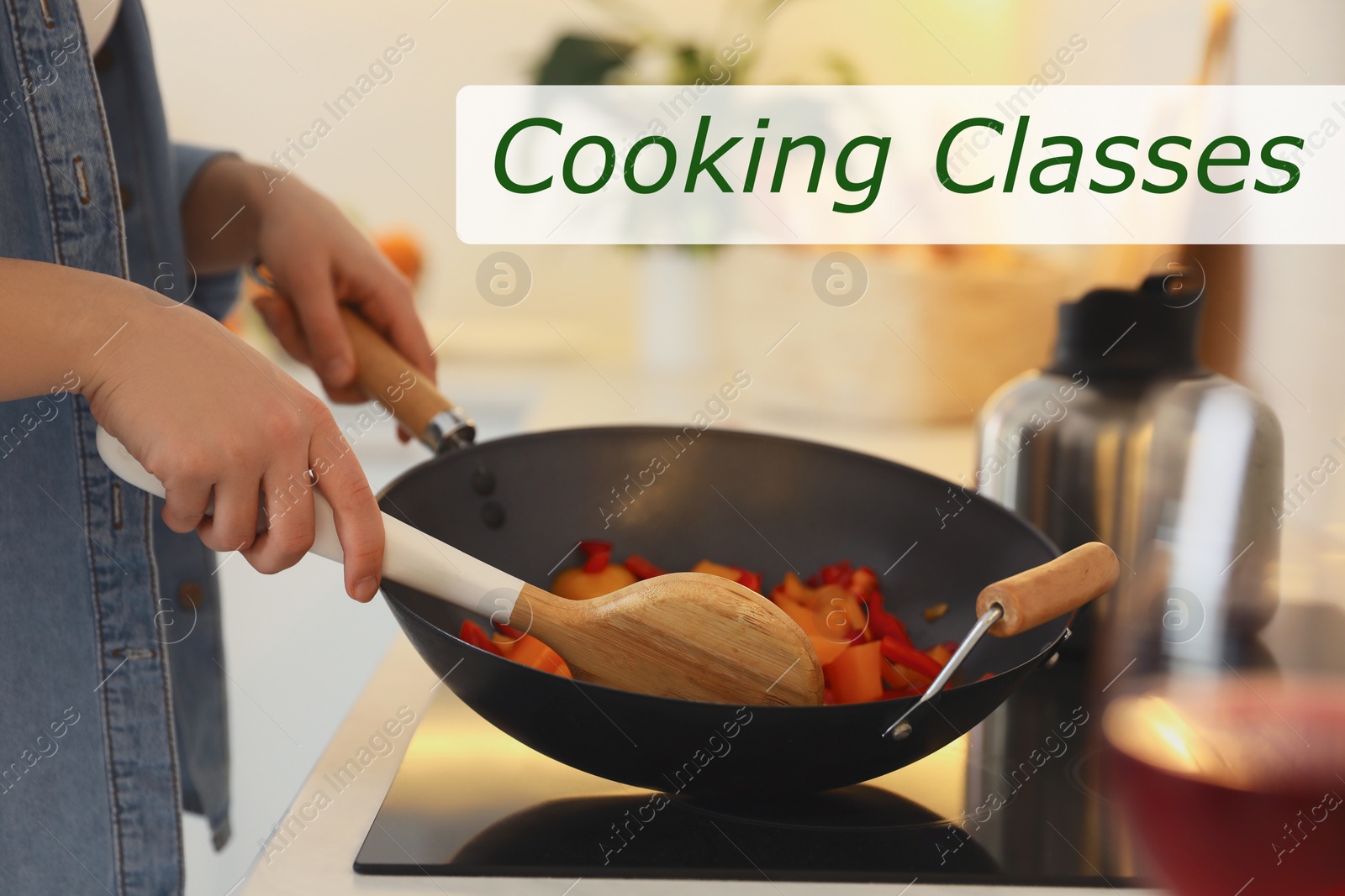 Image of Cooking classes. Woman preparing food on stove in kitchen, closeup