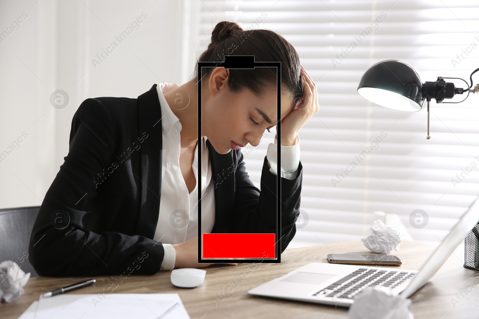 Image of Illustration of discharged battery and tired woman at workplace in office. Extreme fatigue