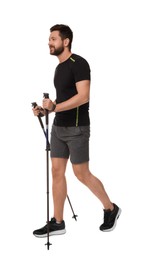 Photo of Man practicing Nordic walking with poles isolated on white