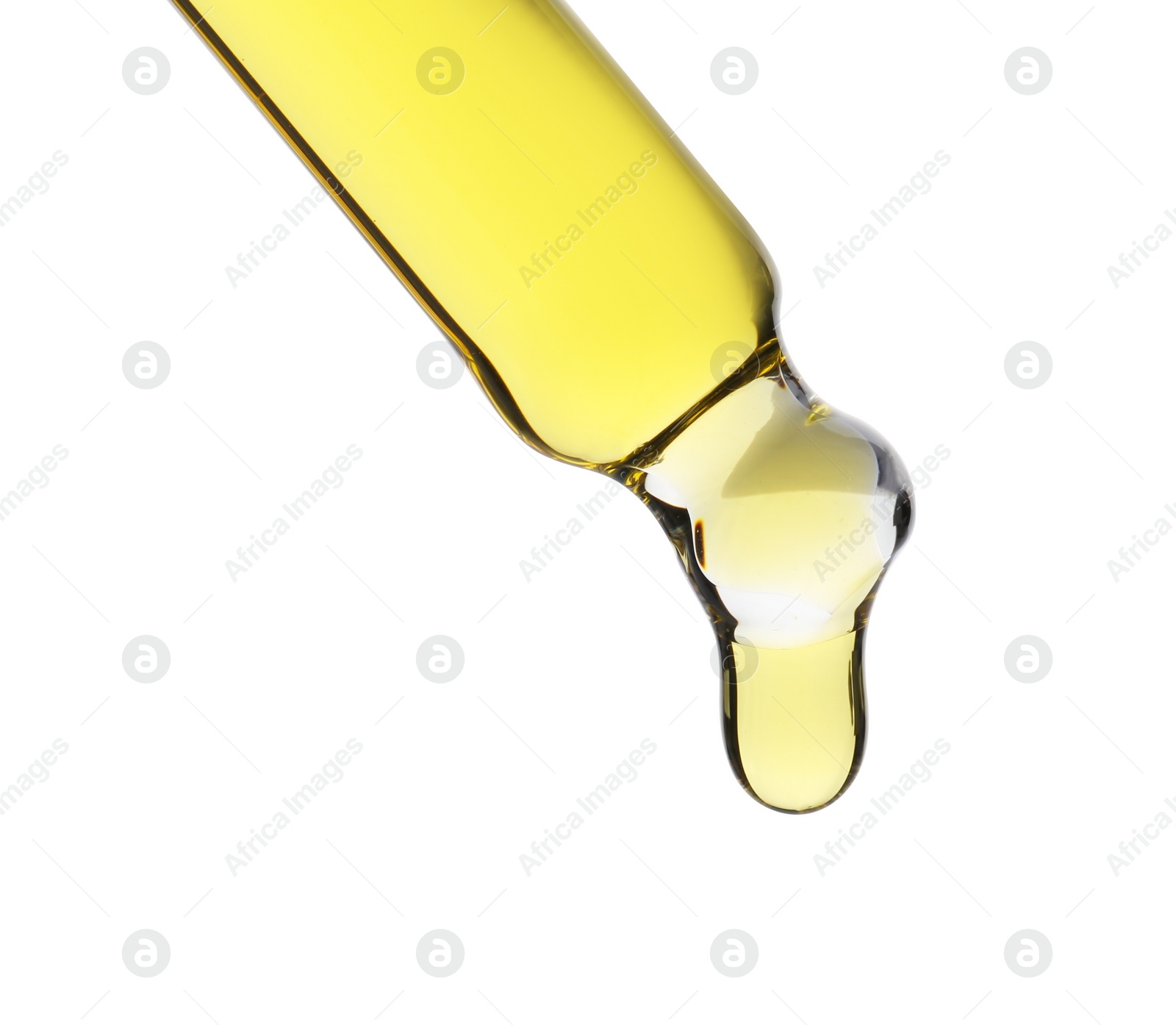 Photo of Dripping tincture from pipette isolated on white