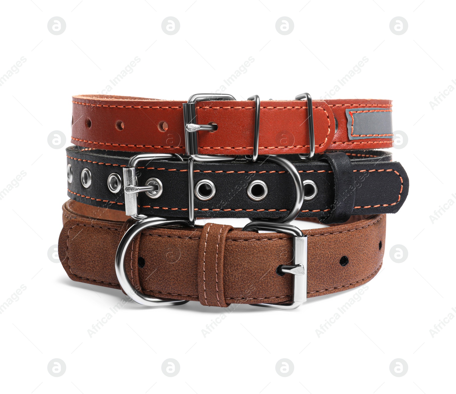 Photo of Different leather dog collars on white background