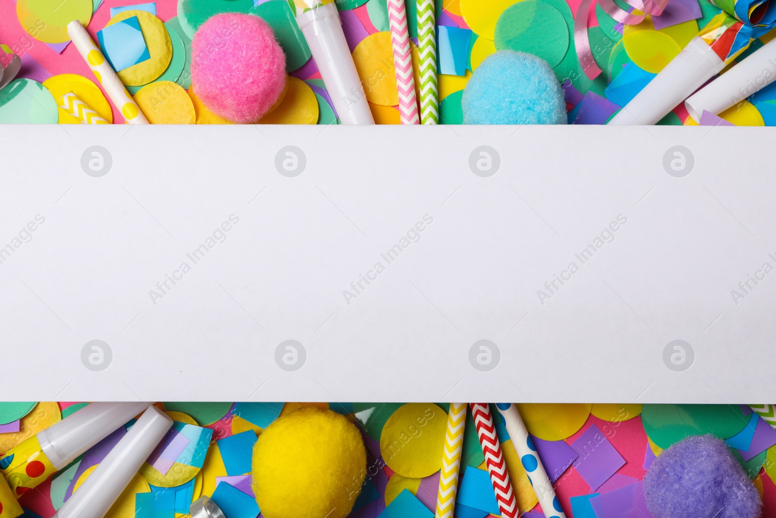 Photo of Blank paper note and decor, top view with space for text. April Fool's Day