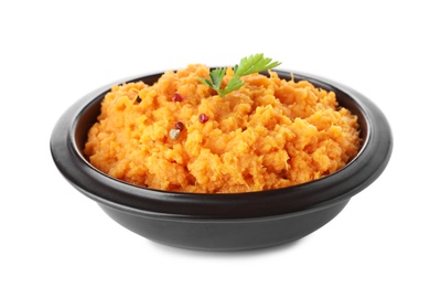 Photo of Bowl with mashed sweet potatoes on white background