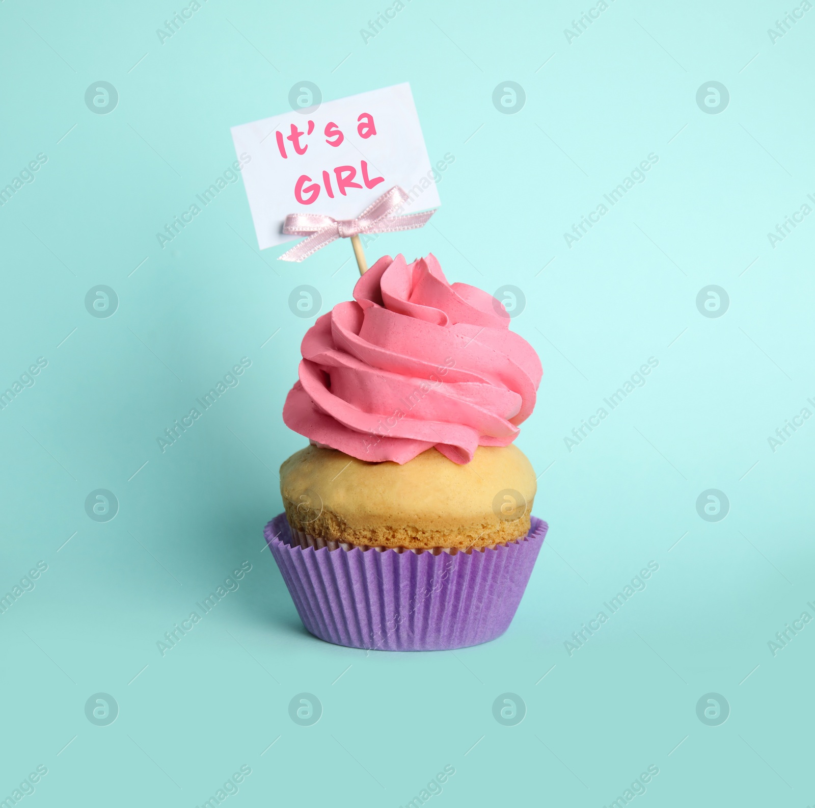 Image of Baby shower cupcake for girl on light blue background