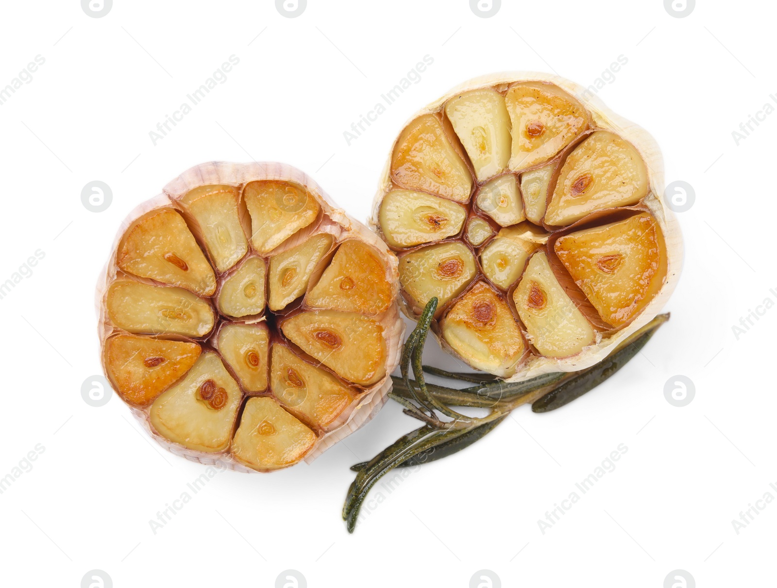 Photo of Heads of fried garlic and rosemary isolated on white, top view