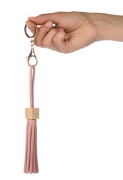 Photo of Woman holding pink leather keychain on white background, closeup