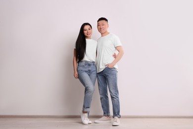 Portrait of happy couple on white background