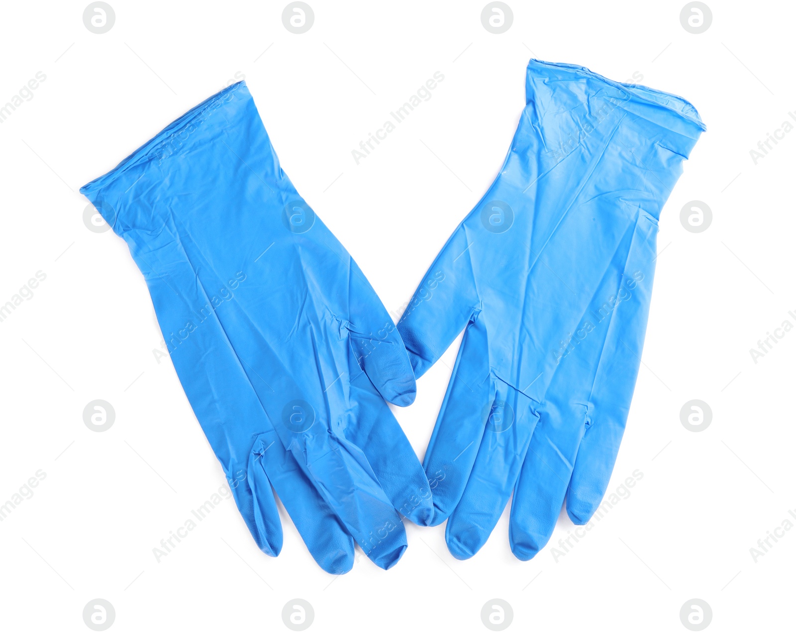 Photo of Pair of medical gloves isolated on white, top view